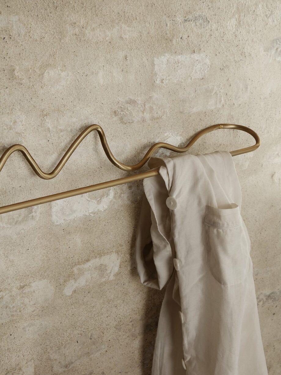 Curvature handdoekhouder voor de badkamer messing detail