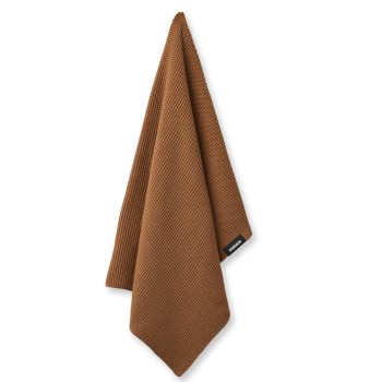 Gebreide keukenhanddoek in Mosterd kleur met zwart Humdakin logo.